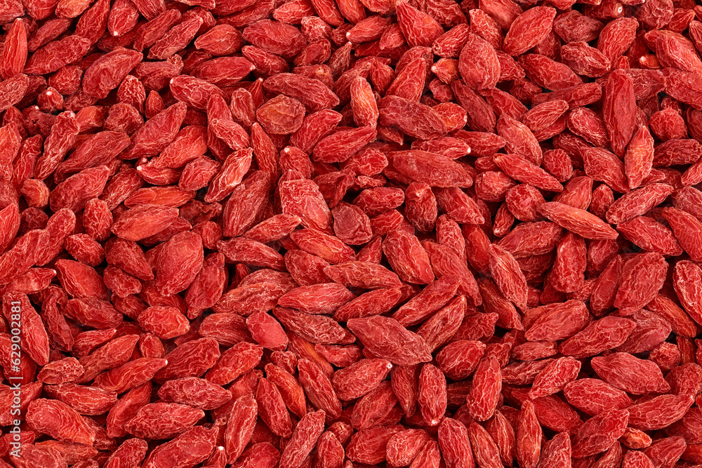 Dried goji berries as a background. Top view. Flat lay. Dried goji berries as a background. Top view. Flat lay.