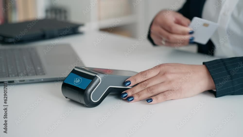 Video close up of hands charging with dataphone and paying with card Video close up of hands charging with dataphone and paying with card