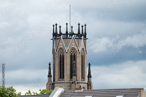 Photography the distinctive steeple of the of the Herz-Jesu church in cologne-Mülheim withou