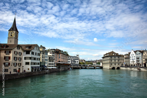 St. Peter Church and Zurich Cityscape by Limmat River - Switzerland