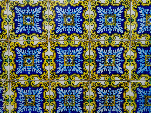 Details of Azulejo  ceramic glazed tiles on facade of houses in Portugal and Spain 