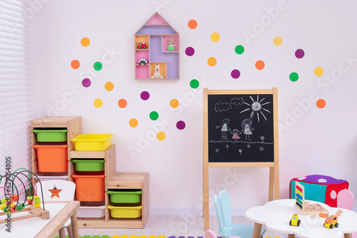 Wallpaper Mural Stylish kindergarten interior with toys and modern furniture Torontodigital.ca