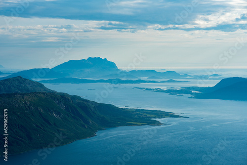 View south from Smaltinden of Brensla, Stockatinden, Hammaröyfjellet and syv søstre in the background. Afternoon hiking in Northern Norway, summer. Fjelltur i Helgeland. Archipelago Norwegian sea.  © Pavel