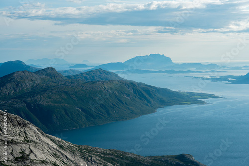 View south from Smaltinden of Brensla, Stockatinden, Hammaröyfjellet and syv søstre in the background. Afternoon hiking in Northern Norway, summer. Fjelltur i Helgeland. Archipelago Norwegian sea. 