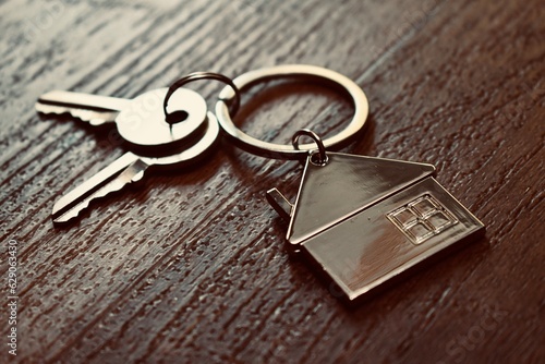House keys on wooden background