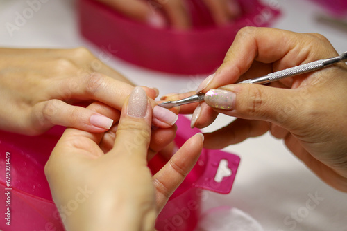Nail treatment before coating with nail polish