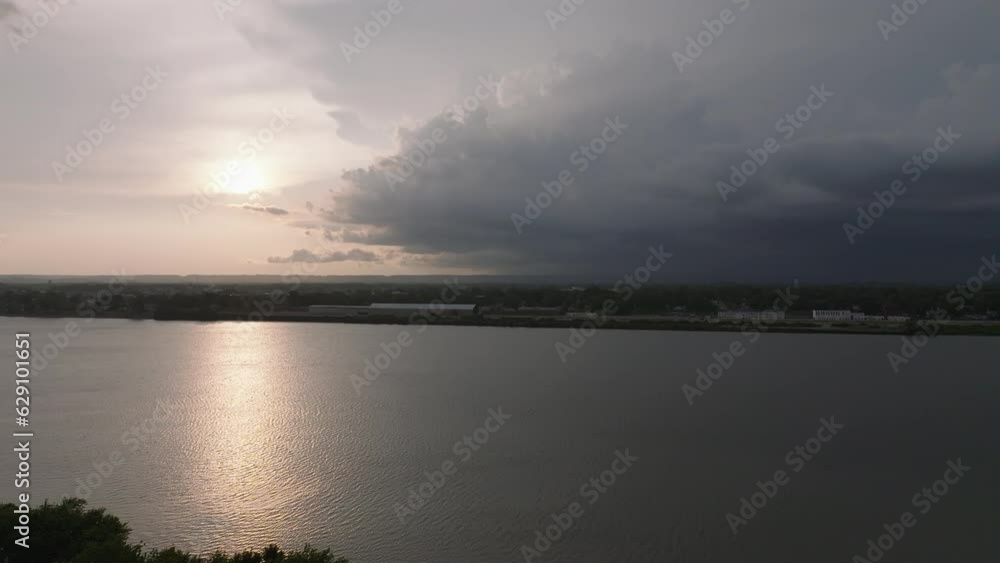 Aerial drone view of a sunset through the clouds over the Ohio River. Aerial drone view of a sunset through the clouds over the Ohio River.