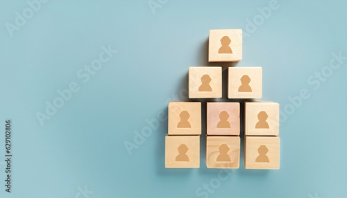 Businessman Hand holding a wooden block target board icon on wooden cube block with icon business strategy. Service concept of business to success Business strategy planning To market victory.
