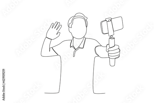 One continuous line drawing of a male vlogger who uses a mobile phone and a selfie stick greets his followers
