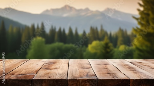 Empty wooden table for product placement or montage with blurred winter forest background. High quality photo. Wooden table in front of abstract blurred background
