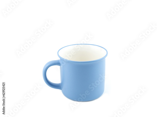 Empty blue mug for coffee or tea isolated on white background. Use for home or restaurant, food design. Concept kitchen utensils and tableware..