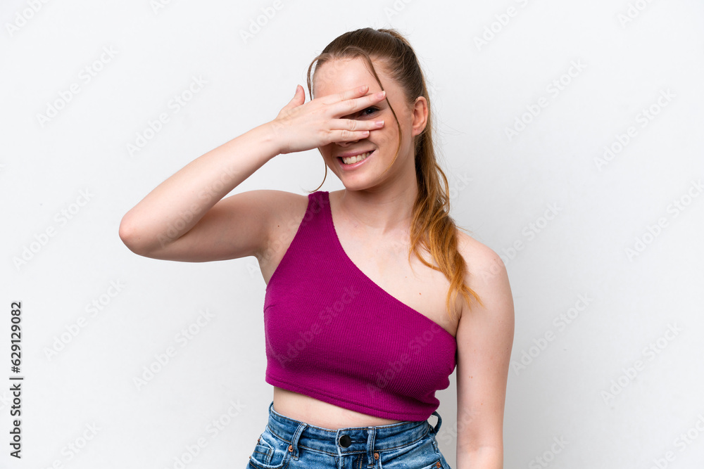 Young caucasian girl isolated on white background covering eyes by hands and smiling Young caucasian girl isolated on white background covering eyes by hands and smiling