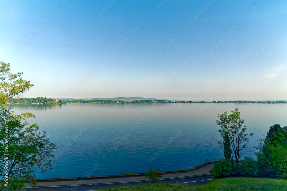 Scenic view of Swiss Lake Zug at Walchwil village on a sunny spring day. Photo taken May 22nd, 2023, Lake Zug, Switzerland.