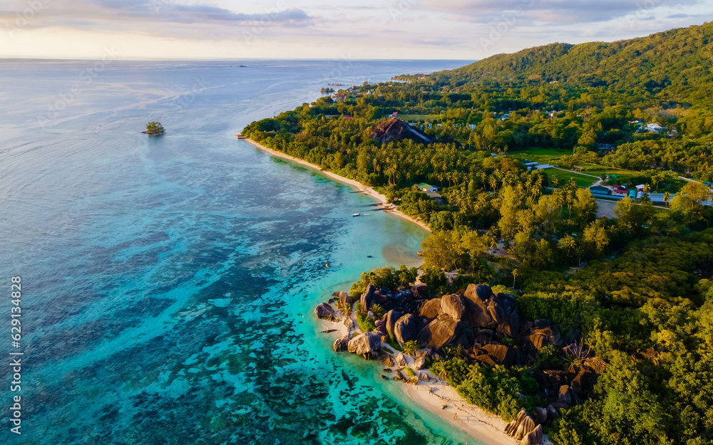 Anse Source d'Argent, La Digue Seychelles, drone view at a tropical beach during sunset