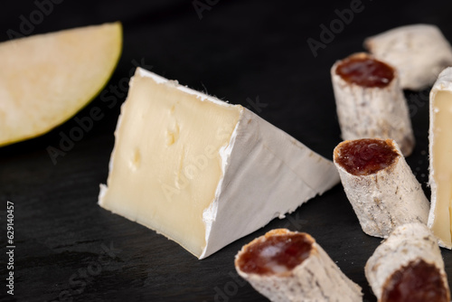 delicious sliced cheese with edible white mold