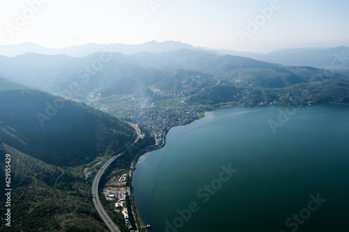 Village and lake in Shuanglang, Yunnan, China. photo