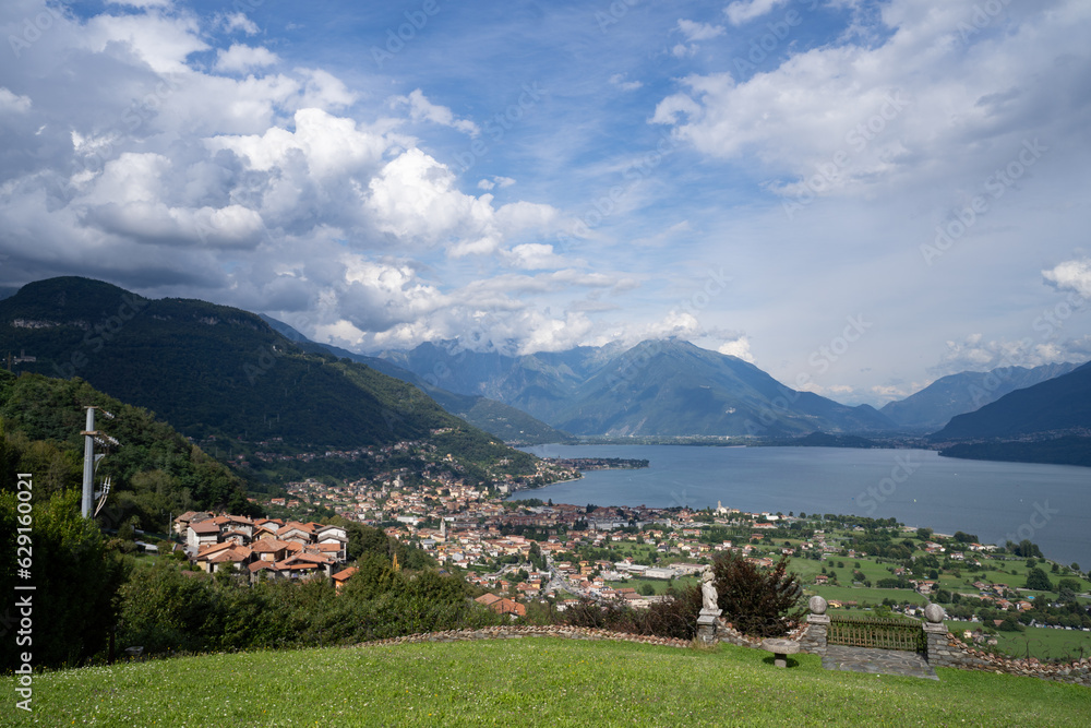 North Como Lake day view in Lombardy with houses and water 
