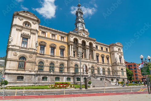 Beautiful City Hall building of the Bilbao city, built in Baroque style. In front of the building is the river Nervion. Travel destination in North of Spain photo