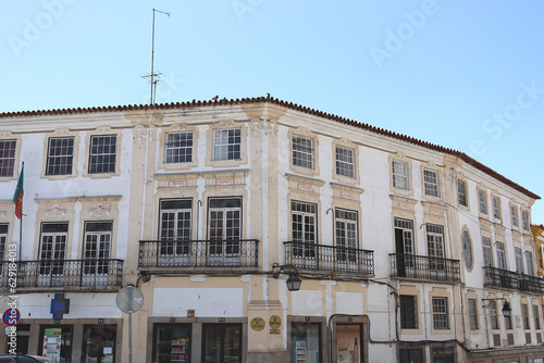 Facades of typical buildings at the main square of the city: Praça do Giraldo, Évora, Alentejo, Portugal photo