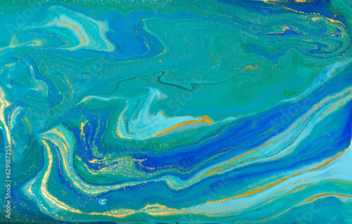 Golden and Green Wave Veins on Blue Marble Background.