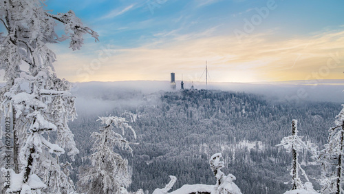 Winter landscape above the Taunus low mountain range with a view of the Großer Feldberg - Hesse, Germany
