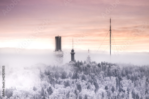Winter landscape above the Taunus low mountain range with a view of the Großer Feldberg - Hesse, Germany