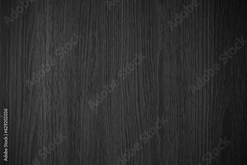 Black and white vertical wood texture background. Dark vertical lines wooden textured background.