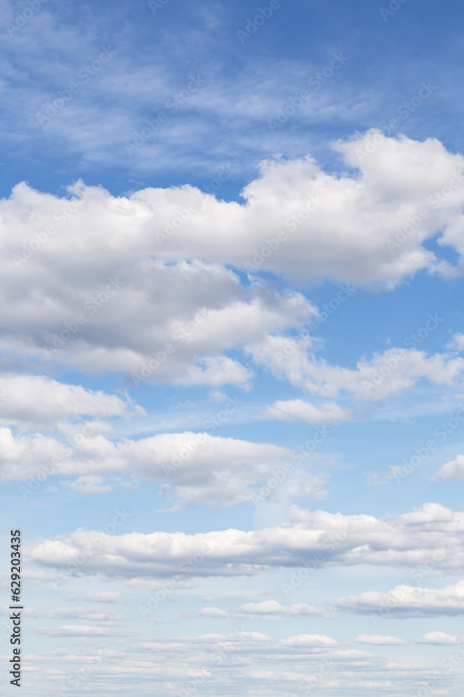 Beautiful epic soft gentle blue sky with white fluffy cloud in sunlight background texture Beautiful epic soft gentle blue sky with white fluffy cloud in sunlight background texture