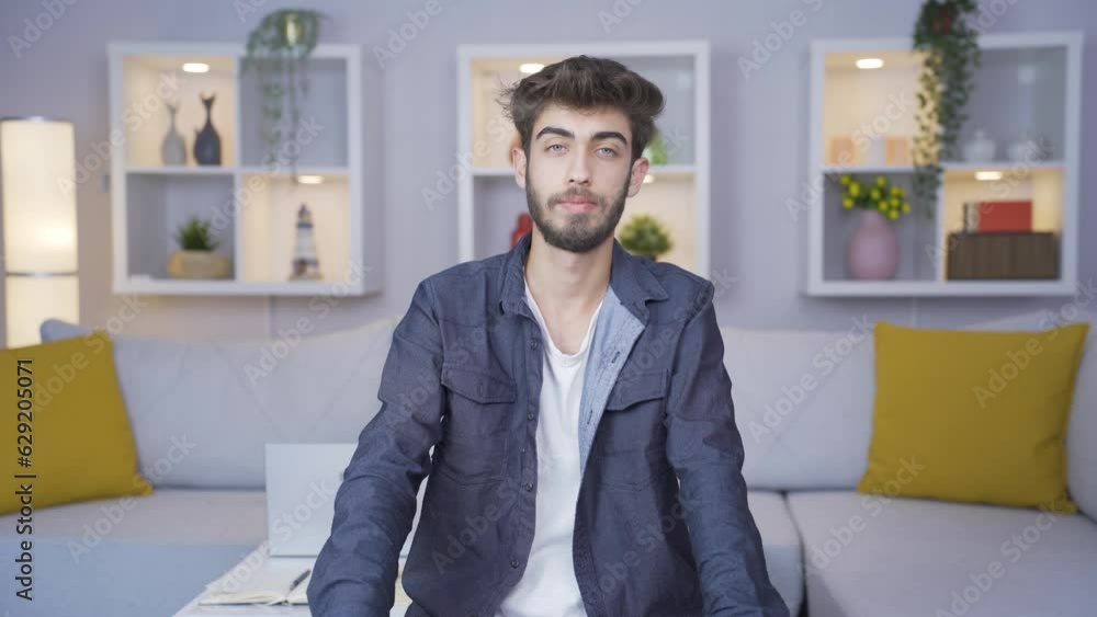 Man looking at camera with a negative expression. Man looking at camera with a negative expression.