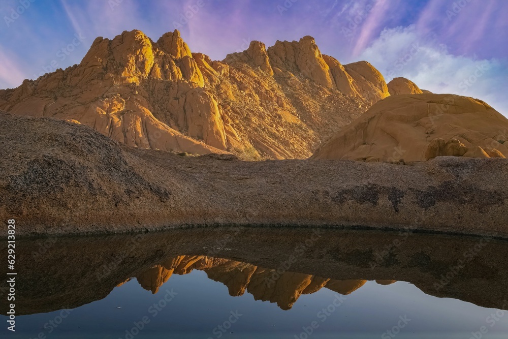 Namibia, reflection of the mountains in the Namib desert