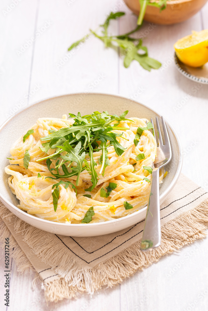 Lemon Ricotta and Rocket Spaghetti Pasta: A Vibrant Italian Delight with Citrusy Flavors and Creamy Lemon Sauce, Topped with Fresh Rocket Leaves - A Must-Try Pasta Recipe
