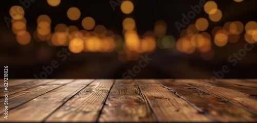 Wooden table in front of bokeh lights. Empty space for your text.