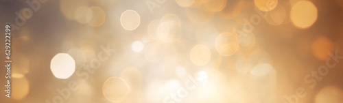 Abstract background of blurred bokeh lights in a warm color palette, ranging from light peach to deep gold, creating a soft and dreamy feel.
