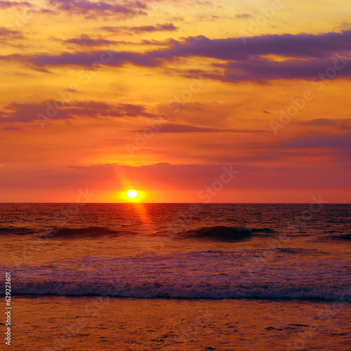 Bright sunset over ocean.