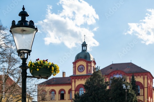 closeup of a streetlight under the blue sky with a blurry background in Serbia