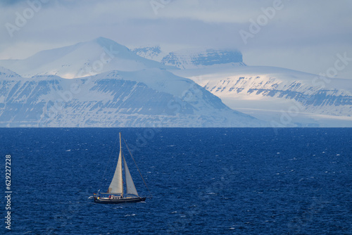 sailing boat on the arctic sea