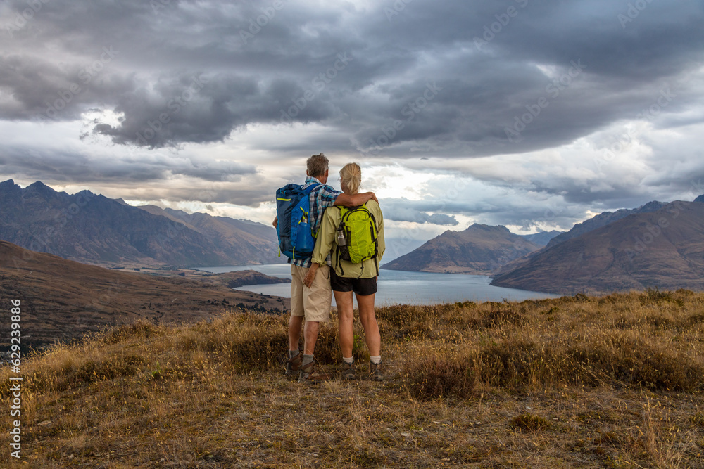 Active seniors hiking travel remote New Zealand landscape