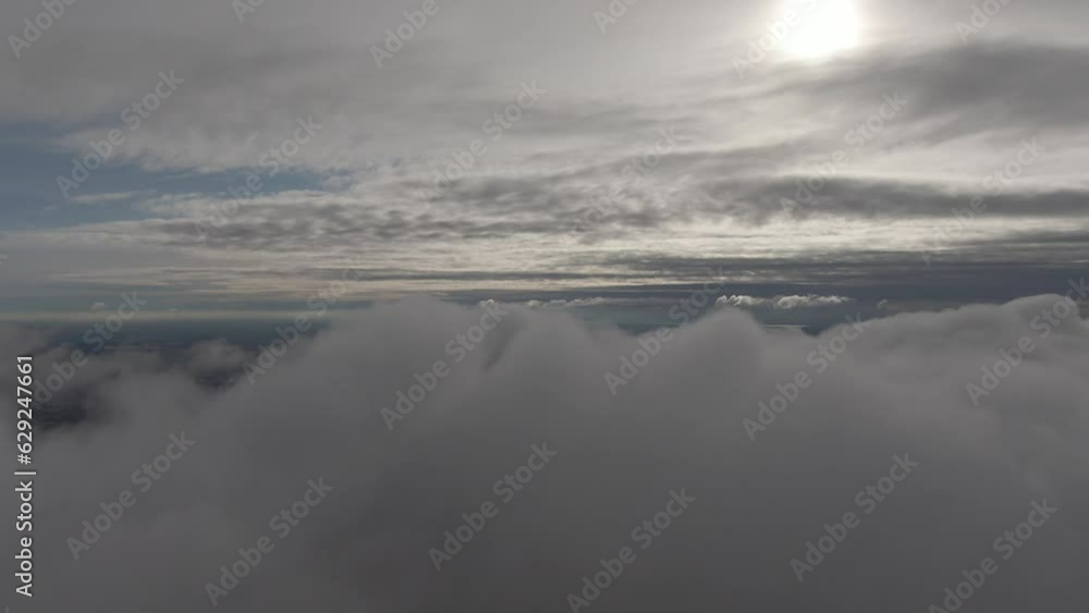 Drone view of soft clouds above landscapes during daytime Drone view of soft clouds above landscapes during daytime