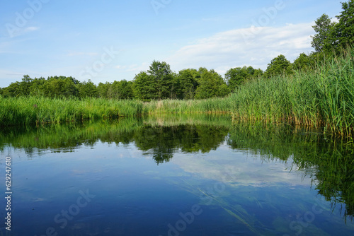 Beautiful landscape of the Krutynia River photographed from a kayak