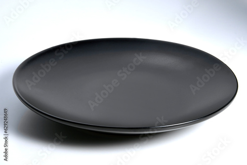 Empty flat Black plate with rounded edges
