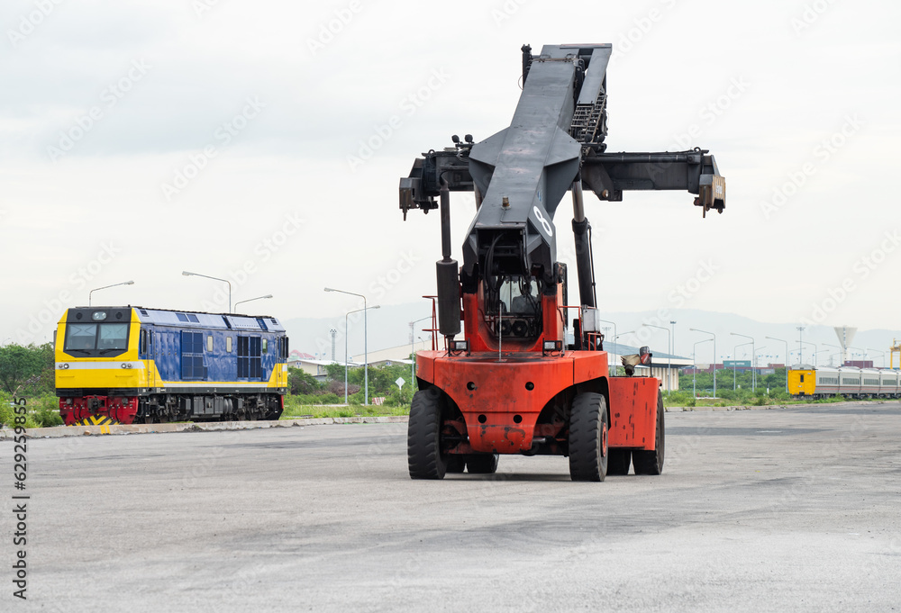 Reachstacker  handling loading Containers At Industrial Port And Container Yard To Truck For Delivery To Customers