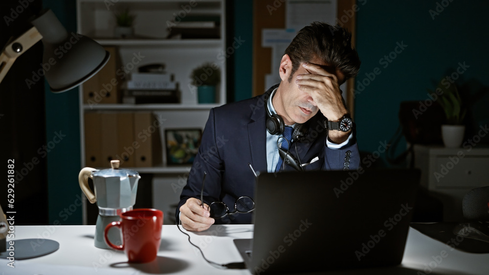 Young hispanic man business worker working stressed at the office Young hispanic man business worker working stressed at the office