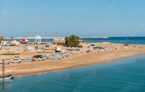 Bay of the Sur city with traditional boats, Sultanate of Oman in the Middle East. photo