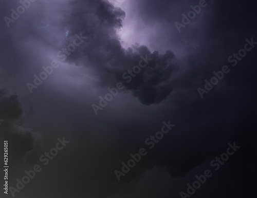 Dramatic lightning storm illuminated in the night sky