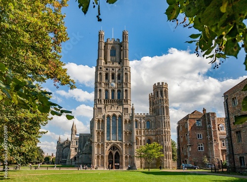 A closeup of old, historical Ely cathedral Cambridgeshire on a sunny day under the blue sky photo