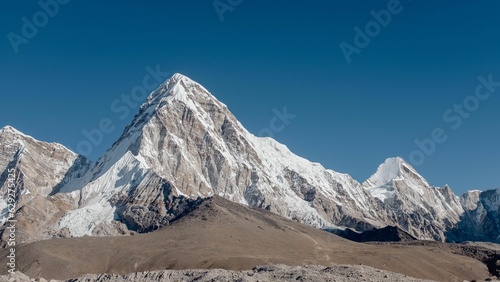 Snow-covered mountain slope in rocky and deserted landscape © Kor69/Wirestock Creators