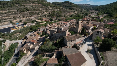 View of the Vallfonona de Riucorb castle and village in Spain as seen from a drone