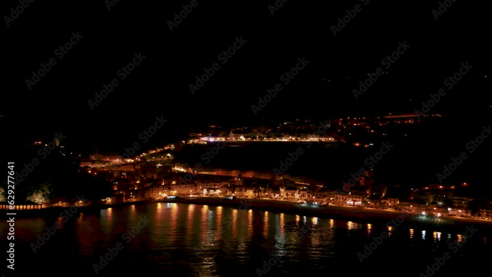 aerial view of the beautiful village of Scilla and Chianalea in Calabria. Note the houses overlooking the sea, the Ruffo castle, the seaside restaurants and the crystal clear Caribbean sea aerial view of the beautiful village of Scilla and Chianalea in Calabria. Note the houses overlooking the sea, the Ruffo castle, the seaside restaurants and the crystal clear Caribbean sea