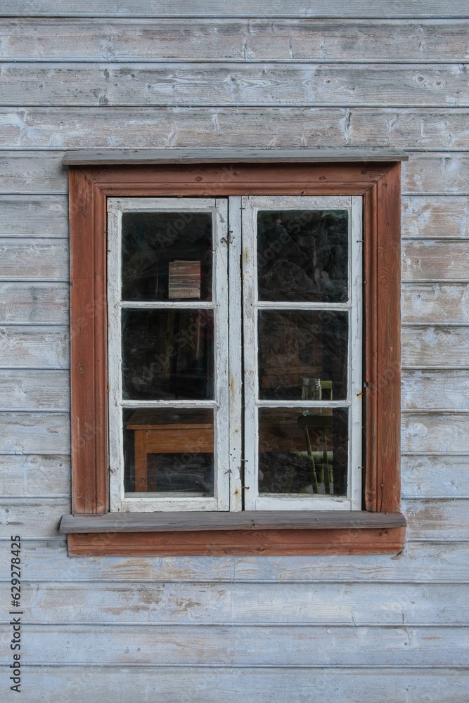 Fototapeta premium Vertical of a window of a Helleren House in Jossingfjord, Norway