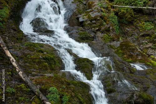 Majestic waterfall cascading down a rocky cliff face